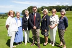 Helen's Bay Golf Club held their annual Captain's Day on Saturday. Included with club captain Alan Thompson are from left, Liz Jackson, Helen Baird, lady vice-president, Mary Corry, lady president, Barbara Edwards, lady captain, Irene Aston, lady honorary secretary and Jean Wood, lady honorary treasurer. P24-27-06-19